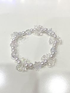 Handmade clear/white plastic beaded bracelet that is stretchy Clear White, Plastic Resin, Plastic Beads, Last Minute Gifts, Beaded Bracelet, Favorite Jewelry, Beauty Book, Jewelry Bracelets, Beaded Bracelets