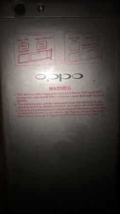 the back side of an electronic device with instructions on it