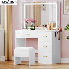 a white vanity table with a mirror and stool