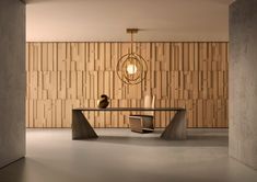 a modern dining room with wood paneling on the wall