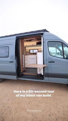 a van with its doors open and the back door opened to reveal a kitchen area