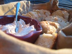 a bowl filled with food sitting on top of a table