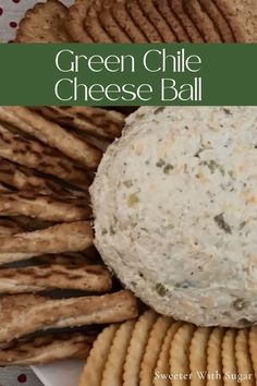 cheese ball surrounded by crackers on a plate with text overlay that reads green chile cheese ball