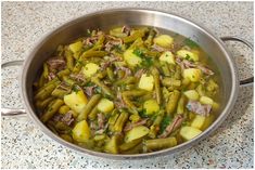 a pan filled with food sitting on top of a counter