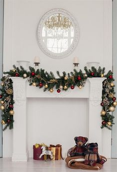 a fireplace decorated with christmas decorations and presents