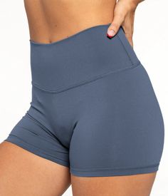 Introducing our seamless women's shorts. We've named these shorts LUXE because they're next level in high quality and comfort. Built with a special blend of nylon and spendex to allow for more freedom of movement during your most rigorious workout sessions. It contains stretchy, moisture-wicking fabric to keep you cool and without distractions to perform at your best! Rose is 5'6'' wearing size S 80% Nylon / 20% Spandex 4.4 inch inseam Designed with Pefect Scrunch Squat proof Solid Seamless Nylon Shorts, Seamless Nylon Solid Color Shorts, Compressive Athletic Shorts For Gym In Gray, Seamless High-waisted Shorts, Gray Compressive Athletic Shorts For Gym, Compressive Gray Athletic Shorts For Gym, Blue Squat-proof Shorts, Functional Squat Proof Shorts, Gray Nylon Shorts