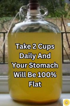 a glass jar filled with liquid sitting on top of a window sill