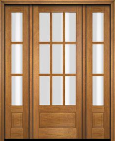 a wooden door with glass panels and sidelights