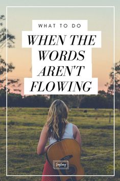 a woman holding an acoustic guitar with the words, what to do when the words aren't flowing