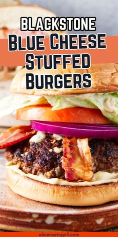 a close up of a burger on a plate with the words blackstone blue cheese stuffed burgers