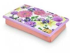 a purple and white flowered tray with a pink lid on it's side