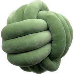 a large green pillow that looks like a knot