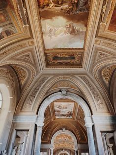 the interior of a church with paintings on the ceiling