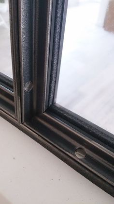 a close up of a window frame on a building