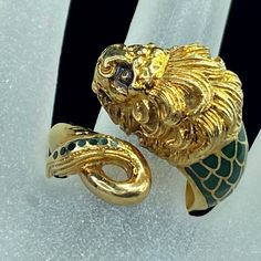 This Is An European Made Statement Ring, Crafted In 18k Yellow Gold, In The Two Bypass Shanks Depicts A Lion Head, The Lion Head Inlay With Multiple Color Of Enamel, And Extend To Part Of The Ring Shank, The Etching Is In Amazing Detail. The Head Is 11.6 X 8.13mm, Ring Size 7.75, Weight 10.1gm, Hallmark 750 (1 Inch = 25.4 Mm; 1 Dime = 17.9mm). All Items Are Pre-Owned Unless Otherwise Stated. This Means They Have The Usual Aspects Of Pre-Owned Jewelry, Such As Light Scratches, Wear And Tarnish. If There Is A Major Dent, Ding, Flaw, Or Bend, It Will Be Noted In The Description. Pre-Owned Jewelry May Contain Minor Markings/Imperfections Throughout. Please Review All Photos Carefully, It Will B Lion Ring Gold, Lion Face Gold Ring For Men, Lion Bangle Gold, Lion Pendant Men, Gold Lion Pendant Jewelry, Ring Shank, A Lion, Lion Head, Gold Enamel