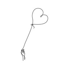 a single line drawing of a person holding a heart - shaped balloon in the air