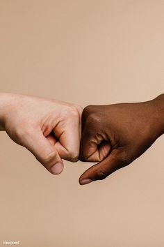 two hands reaching out towards each other in front of a beige background with the word love written on it