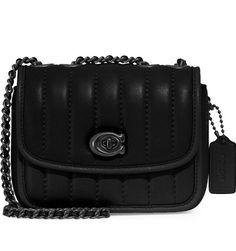 Opt for an always chic look with this COACH Madison shoulder bag. Crafted in a mix of luxe leathers, this compact bag features subtle quilting for elevated appeal. • 6-1/4"W x 5"H x 2"D (width is measured across the bottom of handbag) Handles convert to 22"L shoulder strap • Turnlock closure • Gunmetal-tone exterior hardware, 1 slip pocket & logo • 1 interior multifunction pocket, 3 credit card slots & fabric lining • Nappa leather/smooth leather Includes dust bag Brand new in the original packa Coach Madison Bag Black, Coach Pillow Madison Bag, Coach Pillow Madison, Chloe Bags Handbags, Painted Handbag, Compact Bag, Black Leather Shoulder Bag, Women Crossbody Bag, Handbag Handles