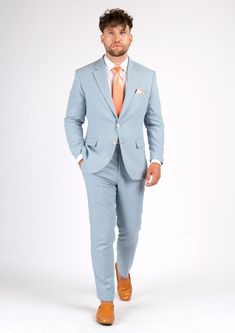 Step out in style in the Astor Maya Blue Linen Suit. Perfect for summer, this light blue linen cotton blend is sure to give your wardrobe a cozy vibe. Don't just look good - feel good too with this light and bright custom suit! Tailored Light Blue Suits For Spring, Light Blue Tailored Suit For Spring, Light Blue Linen Suit Men, Blue Business Suits For Summer, Blue Summer Business Suits, Blue Spring Wedding Suit, Light Blue Notch Lapel Suit For Spring, Blue Linen Suit For Work, Blue Business Casual Suit For Spring