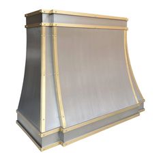 an image of a stove hood that is made out of metal and gold plating