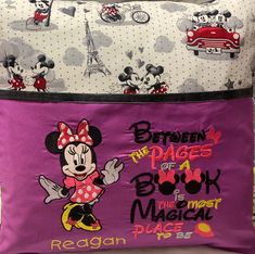 two disney mouse pillow cases one is purple and the other is white