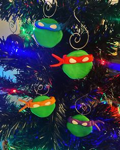 a christmas tree decorated with teenage mutant ornaments