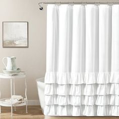 Give your bathroom a makeover with this Allison White Ruffle Shower Curtain. Its chic, yet whimsical design will bring a cozy cottage look to your space! Curtain measures 72L x 72H in. Crafted of polyester Ruffled design Hues of white Features twelve (12) button holes for easy installation Liner not included Care: Machine washable. This item is available at Kirklands.com only, not available in stores. Please note: this item cannot be shipped to APO/FPO addresses. | Allison White Ruffle Shower Curtain, White, 72L x 72H , Polyester | Kirkland's Home White Ruffle Shower Curtain, Ruffled Shower Curtain, Ruffle Shower Curtain, Shower Curtain White, Ruffle Shower Curtains, Curtains Pictures, Curtain White, Lush Decor, White Shower Curtain