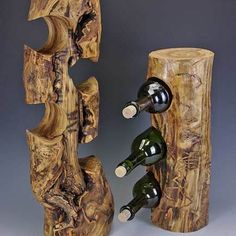 two wooden wine racks with bottles in them