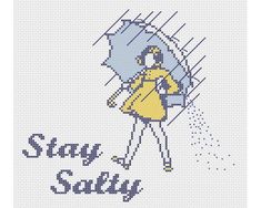 a cross stitch pattern with the words stay salty and a woman holding an umbrella in the rain