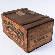 an old wooden box that has been used as a storage container for cigars and souvenirs