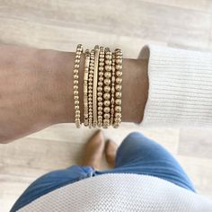 Textured Bracelet Stack - 14k Gold Filled A gold beaded bracelet stack, curated mix of sizes and textures. Aesthetic Hair Clips, Jewellery Content, Bracelet Stack Ideas, Mens Necklace Fashion, Beaded Bracelet Stack, Gold Bracelets Stacked, Textured Bracelet, Stacked Bracelets, Gold Beaded Bracelet