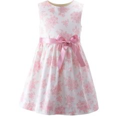 A beautiful cotton dress with soft pink floral design and coordinating ribbon bows and piping trim. Fully lined with sash tie in the back. | Rachel Riley | Floral Toile Dress, (Pink, Size 4Y) | Maisonette collects the best children’s products from around the world (unlike Zulily, Etsy, The Tot, Farfetch Kids, Childrensalon, Crate and Kids, Kohls, Wayfair, Buy Buy Baby, Nordstroms, Mini Boden, J.Crew Factory, or PotteryBarn Kids), creating a curated shopping experience for you. Think of us as your shortcut to fashion for litte ones! Toile Dress, Rachel Riley, Floral Toile, Pink Floral Design, Normal Clothes, Steam Iron, 2023 Collection, Pink Design, Gathered Skirt