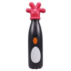 a black and white penguin shaped water bottle with an orange nose on it's head