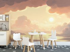 a child's room with clouds painted on the wall and two white chairs in front