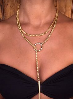 "Trendy Long Doubble Wrap chain. Goldfielld Necklace with Charm and Element Pendant, Statement Women Jewelry A fashionable necklace that will definitely become your favorite one. This necklace features double-wrap braided chain.  In its edges, it has several 14k goldfilled element pendants that add charm to it.    Wear it long as a \"Y\" necklace or wrap it around the neck as a layered necklace. You can Style it with an evening dress, t-shirt, and jeans, or a boho top tank. Either way, you're sure to dazzle for those who value trendy vision! Add this fabulous necklace to your jewelry collection or give it as a gift to a dear woman in your life.  ~ << ✦ ✥ ✥ ✥ ✦ >> ~  ▲ Material: 14 k goldfilled   ▲ Measurement: Necklace length - 95 cm  ▲ Care instructions: I use the best and high-quality ma Chic Long Drop Gold Necklace, Gold Dangle Chain Necklace For Layering, Gold Layered Choker Necklace, Trendy Gold Long Drop Earrings, Trendy Long Drop Gold Jewelry, Gold Choker Drop Necklace With Clavicle Chain, Gold Dangle Drop Necklace For Party, Gold Dangle Lariat Necklace For Parties, Chic Gold Lariat Necklace With Clavicle Chain