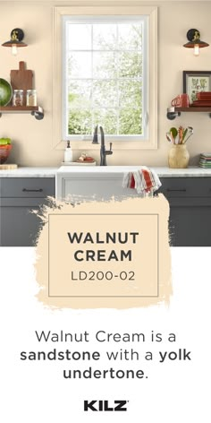 a kitchen with an advertisement for walnut cream on the wall and below it is a sink