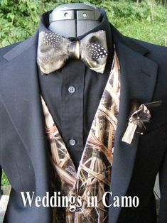 a man wearing a suit and bow tie with the words wedding in camo on it