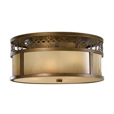 a semi flush light fixture with an intricate design on the top and bottom half of it