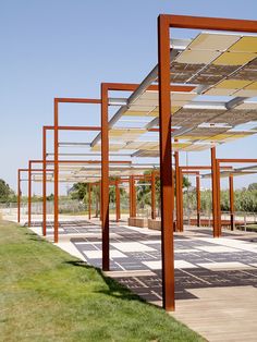 an outdoor covered area with lots of metal structures