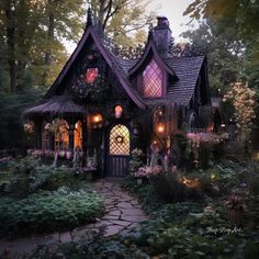 a fairy house in the middle of a garden