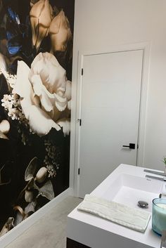 Black floral wallpaper in a bathroom across from a white sink and vanity Floral Wallpaper Bathroom, Wallpaper For Bathroom, Floral Mural, Wallpaper Bathroom, Flowers Easy, Bathroom Walls