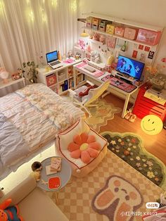 a bedroom with a bed, desk and television in the corner is decorated in pastel colors