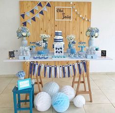 a table with blue and white decorations on it