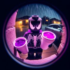 a lego spider man holding two buckets of purple liquid