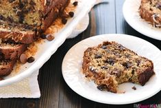 slices of chocolate chip banana bread on white plates next to another plate with one slice missing