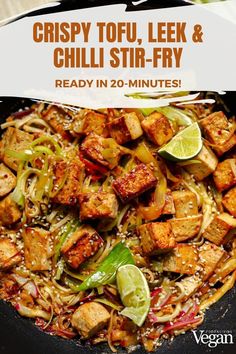 a skillet filled with tofu and vegetables on top of a wooden table next to a sign that says crispy tofu, leek & chilli stir - fry