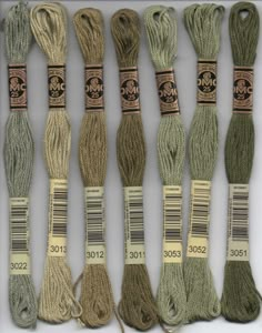 several skeins of different colors of yarn