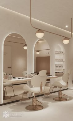 the interior of a hair salon with white chairs and lights on each side of the room