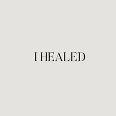 the word i healed in black and white on a gray background with an image of a