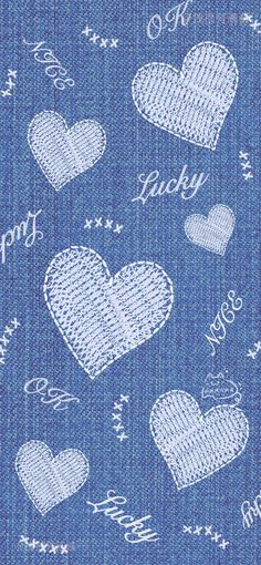 denim fabric with hearts and words written on it